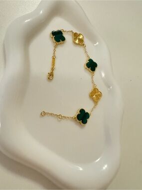 Gold Clover Link Bracelet with Green Accents. Non-tarnish 18k gold plated.